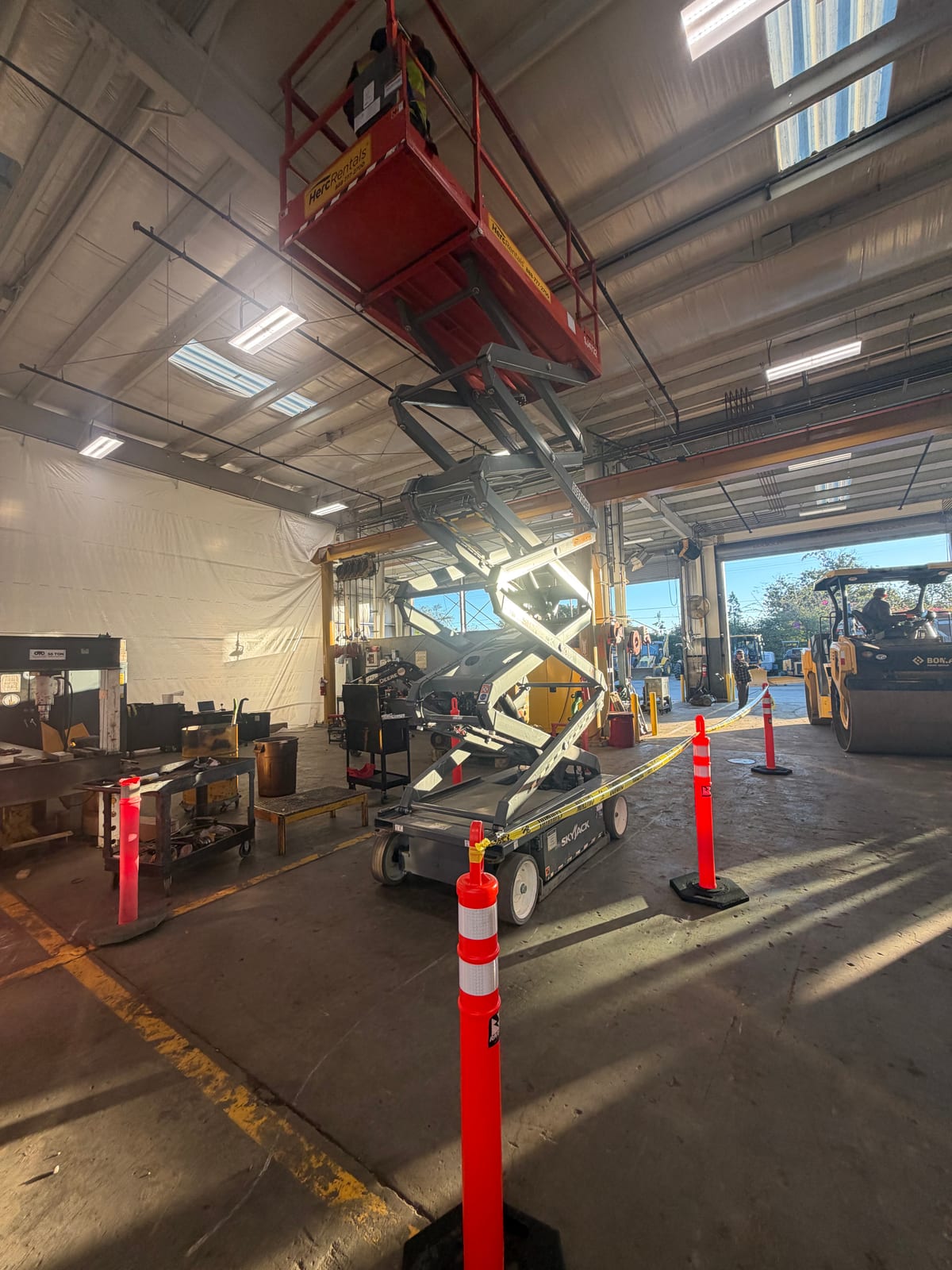 Warehouse electrical work with scissor lift